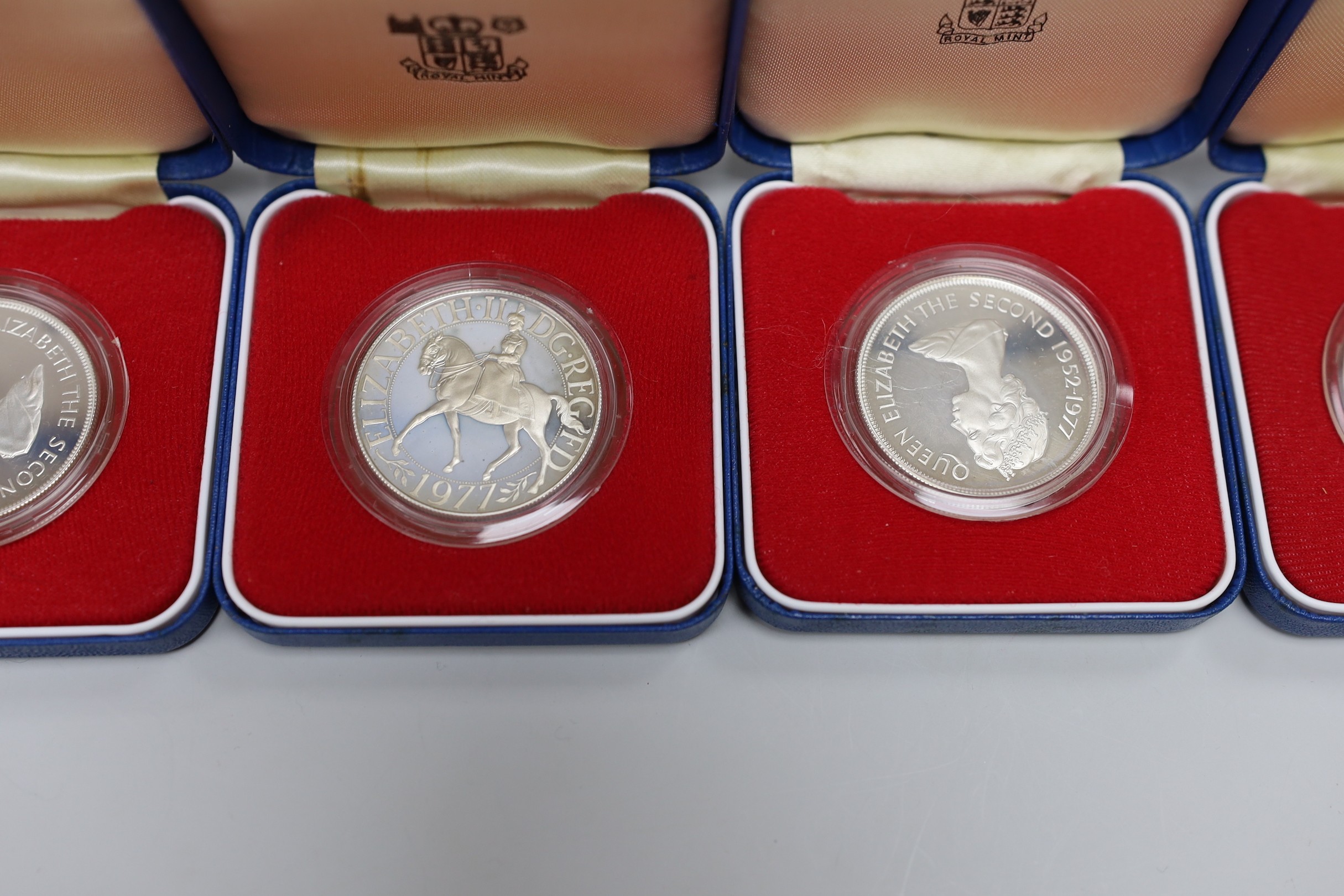 Royal Mint proof silver coins - three QEII UK Silver Jubilee crowns and four Commonwealth crowns (7)